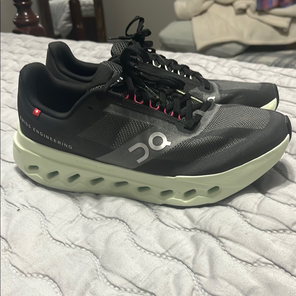 On Running Men's Black Running Shoes. On Cloudsurfer Next.